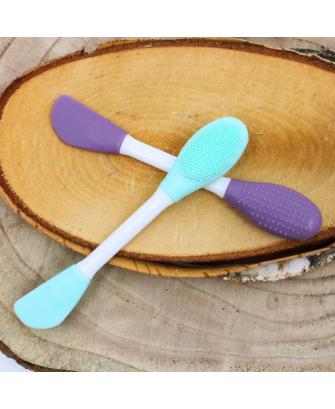 Spatule  brosse visage à double face violette